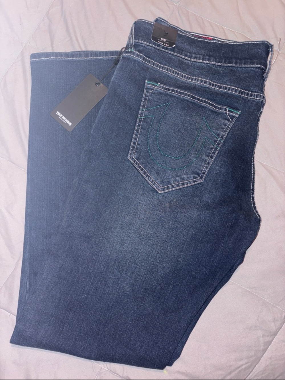 True Religion Indigo Blue Denim Jeans with Signature Back Pocket Stitch